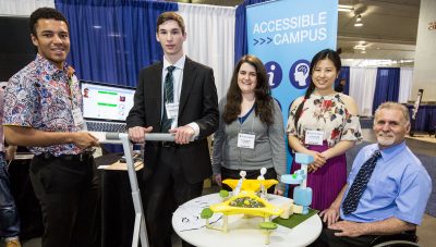 READ Director Dean Mellway (left) with Carleton undergraduate student finalists,  (left to right, Quayce Thomas, Brendan O’Brien, Dayna Conway and Jin Kyung Kim) and their projects at the 2015 IDEA finale, May 29, 2015, at the People in Motion Exhibition