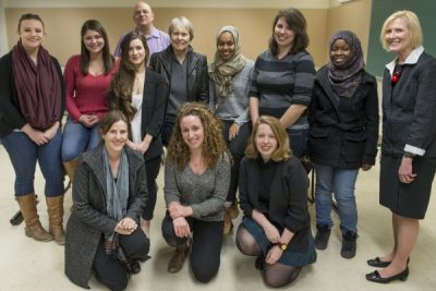 Roberta Bondar with students and President Runte in class