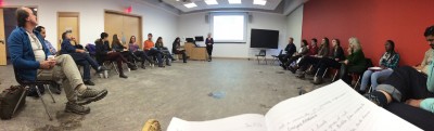 A room full of attendees listen to presentations at the Trent University MASS program Colloquium (January 2016).