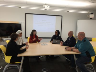 The Second Language Research Group engaged in discussion. Left to right: Eva Kartchava (Assistant Professor, ALDS), Genan Hamad (MA student, ALDS), Olga Makinina (PhD student, ALDS), Farzaneh Salehi Kahrizsangi (PhD student, Education, UOttawa), David Wood (Associate Professor, ALDS), Don Myles (Contract Instructor, ALDS)