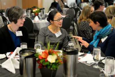Sarah Casteel (English), Ming Tiampo (Art History), and Catherine Khordoc (French, Dean of FASS) share a discussion at the awards ceremony.