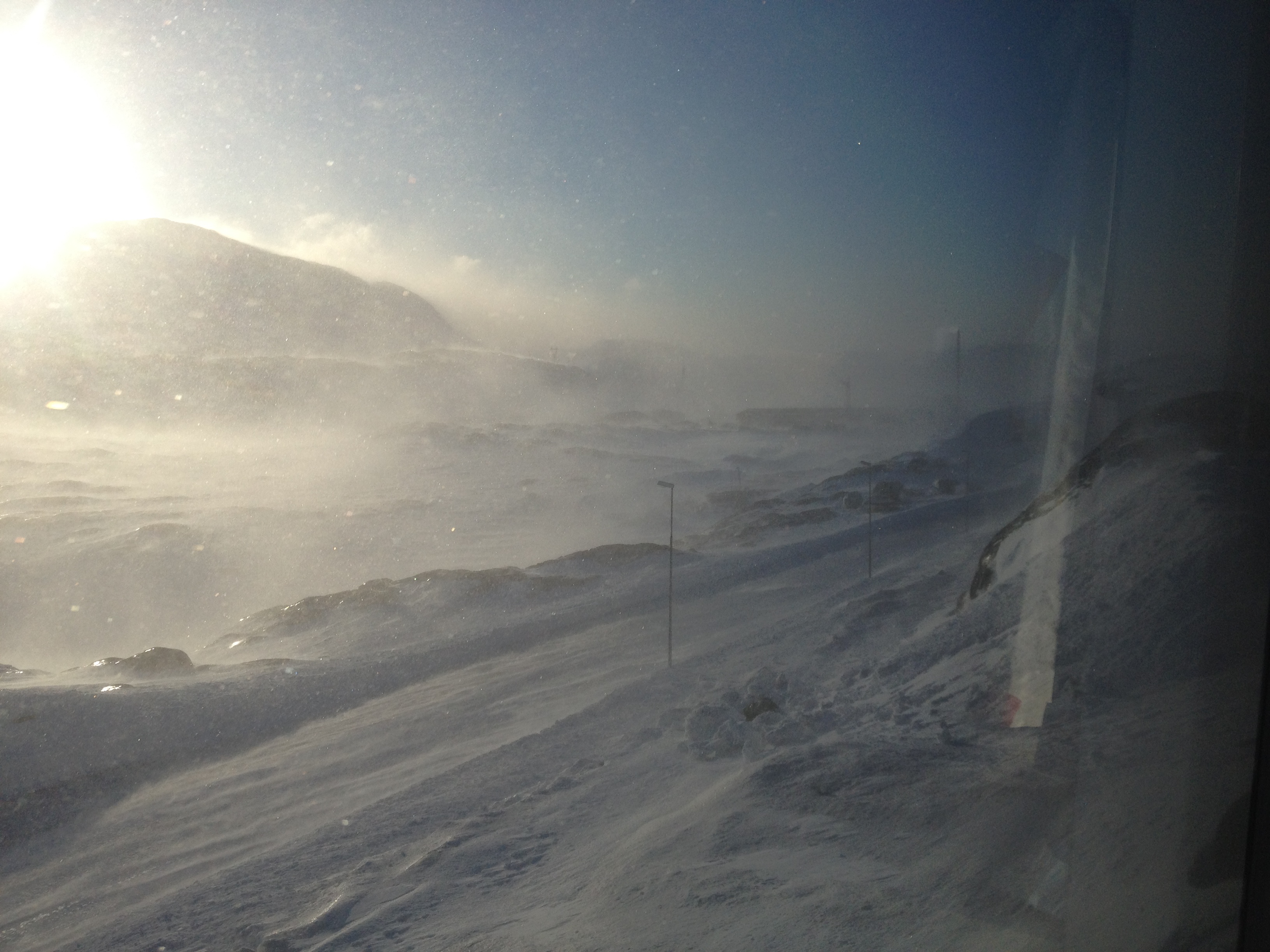 A view of blowing snow out of the window of the Greenland Institute of Natural Resources (GINR) residence building. This is my favourite kind of weather.
