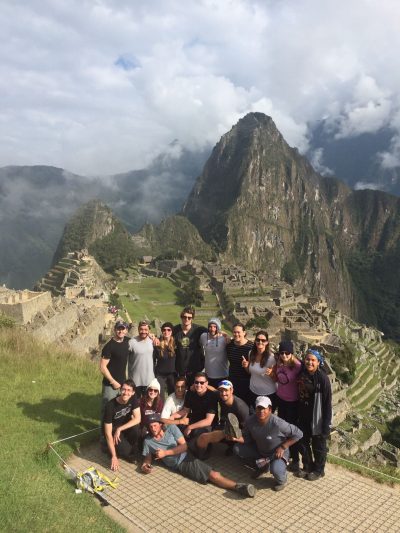 Evan Jones with others in front of Machu Picchu