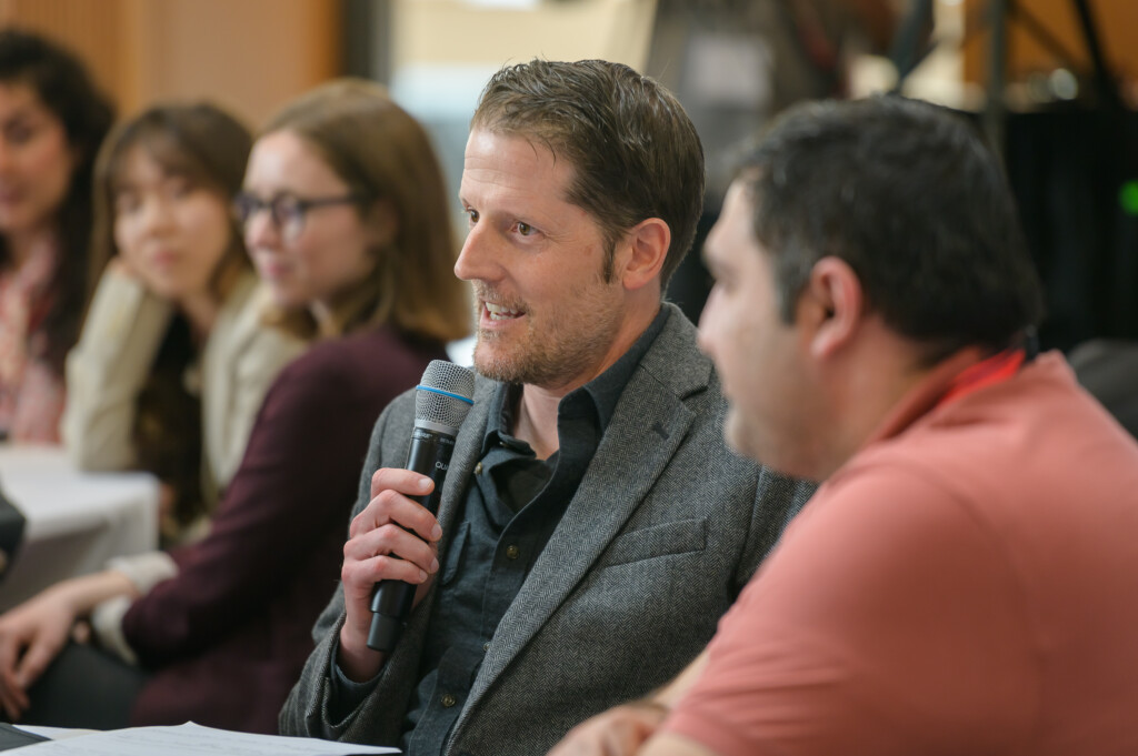 Participants engaging during a facilitated discussion session.