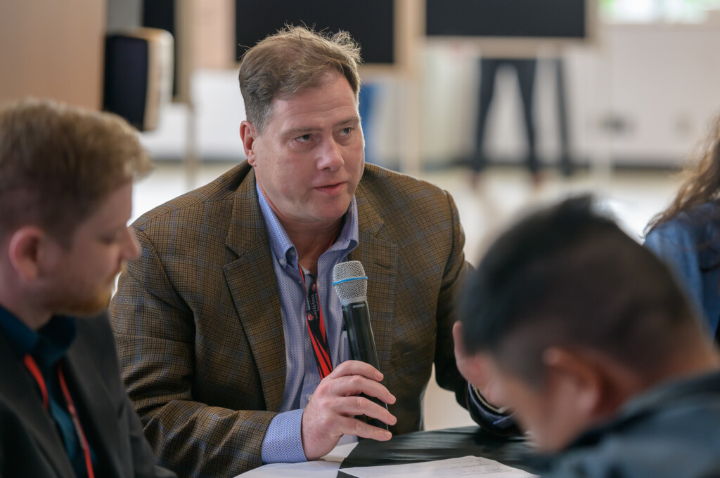 Participants engaging during a facilitated discussion session.
