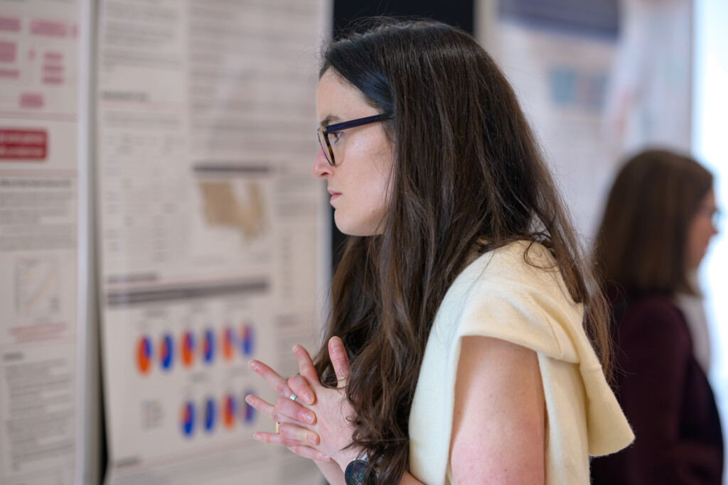 Attendees engaging in poster discussions during CanCH₄ Symposium