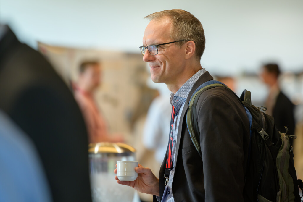 Attendees engaging in poster discussions during CanCH₄ Symposium