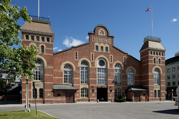 Cartier Square Drill Hall, a broad, arcaded brick building built in 1879.