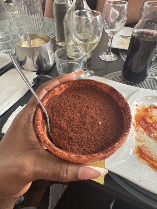 Overhead view of a small bowl of tiramisu.