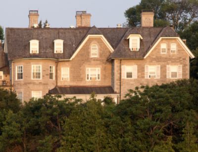 A limestone building bathed in late-afternoon light.