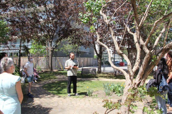 A student tour guide leads a tour of CDCC.