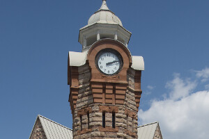 Stone tower with clock.