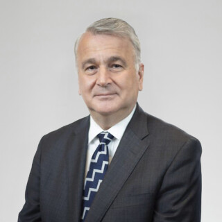 Professional photo of Nik Nanos.