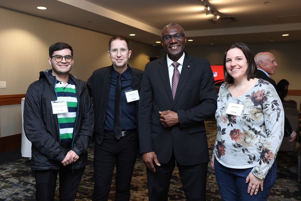 President Wisdom Tettey (2nd from right) poses with guests at Carleton's reception in Vancouver on April 23, 2026.