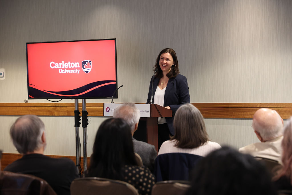 Corrie Hobin, Chief Advancement Officer, addresses guests at Carleton's reception in Vancouver on April 23, 2026.