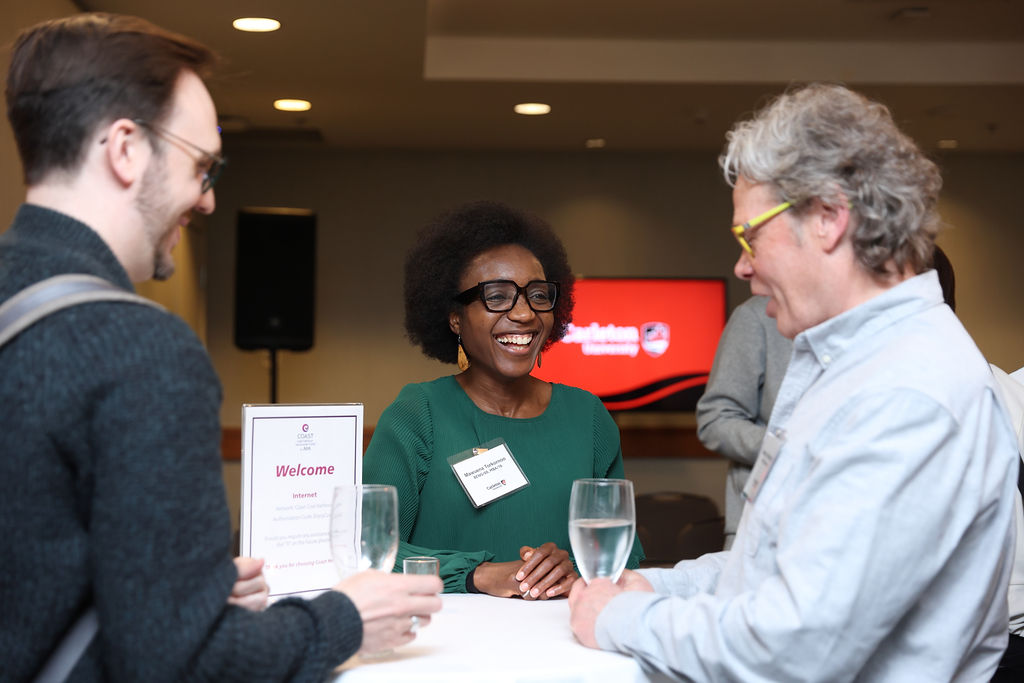 Mawuena Torkornoo (centre) chats with guests at Carleton's reception in Vancouver on April 23, 2026.