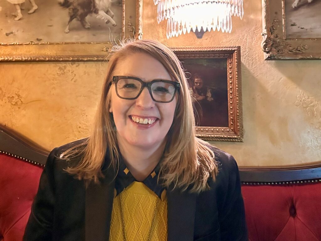 Susan smiles for a photo
