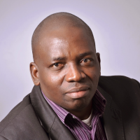 A headshot of Dr. Samuel Ojo Oloruntoba
