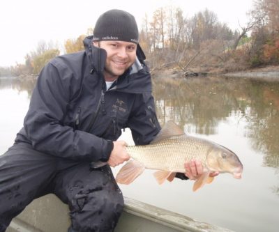 picture of Dr. Steven J. Cooke holding a fish
