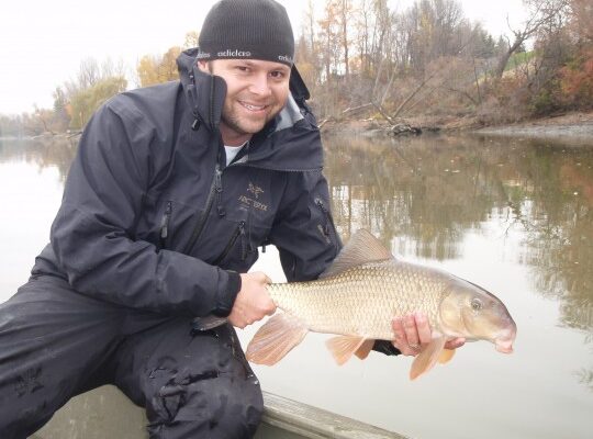 picture of Dr. Steven J. Cooke holding a fish
