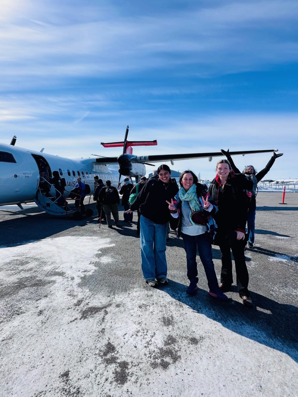 Professor Onita Basu poses with two of her graduate students, Kaitlyn Shaw & Raini Perera in Kuujjuaraapik, Canada
