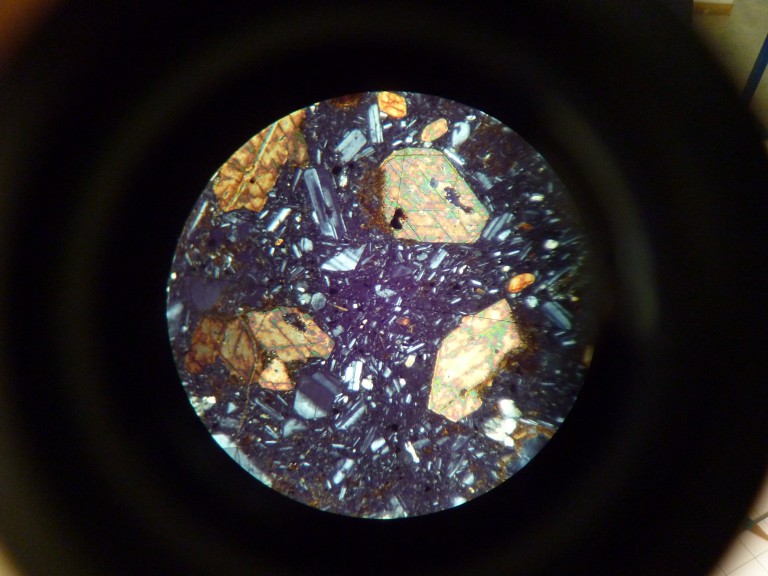 This is a piece of pottery from the Aegean Sea seen with a petrographic microscope.
