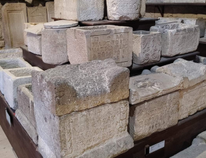 A pile of stone funerary boxes