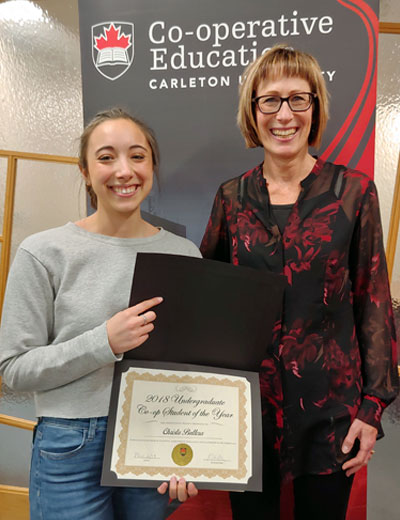 2018 Undergraduate Co-op Student of the Year, Christa Buttera holding her Co-op Student of the Year certificate, with Kathleen Hickey, Manager of Co-operative Education. 