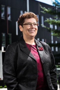 Portrait of Karen Schwartz, Academic Co-lead of CFICE's Poverty Reduction Hub.