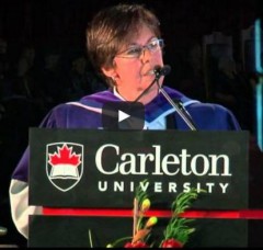 Play head image depicting Kim Pate, VAW Community Co-lead, giving a speech at a Carleton University graduation ceremony.
