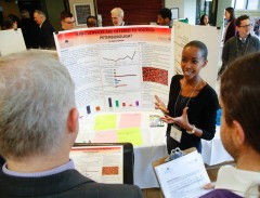 A student explains her project to listeners at TCRC's Community Engagement Forum April 7, 2016.