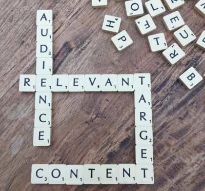 Scrabble tiles in the words "Audience", "Relevant", "Target" and "content".