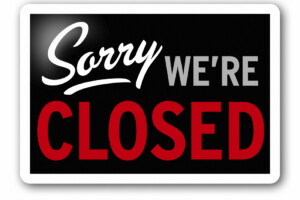 sign that reads 'Sorry we're closed'