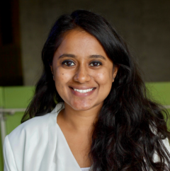 Photo of Anamika Jaydenran in a school setting, wearing a white shirt