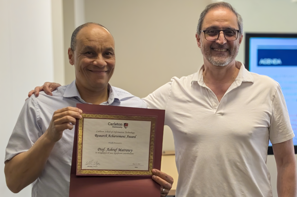 Professor Ashraf receiving the 2026 CSIT Research Achievement Award