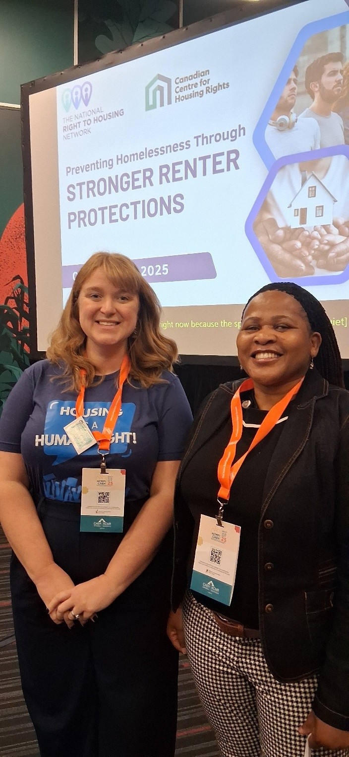 A photo of Dr. Tsitsi Mpofu-Mketwa standing beside Michele Biss, Executive Director of the National Right to Housing Network. They are smiling and posing together at the CAEH25 conference venue in Montréal. A conference banner is visible behind them.