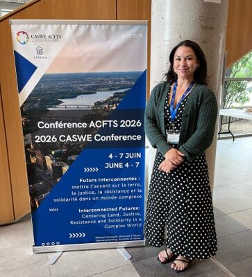 Photo of graduate student at social work conference