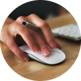 Hand using computer mouse