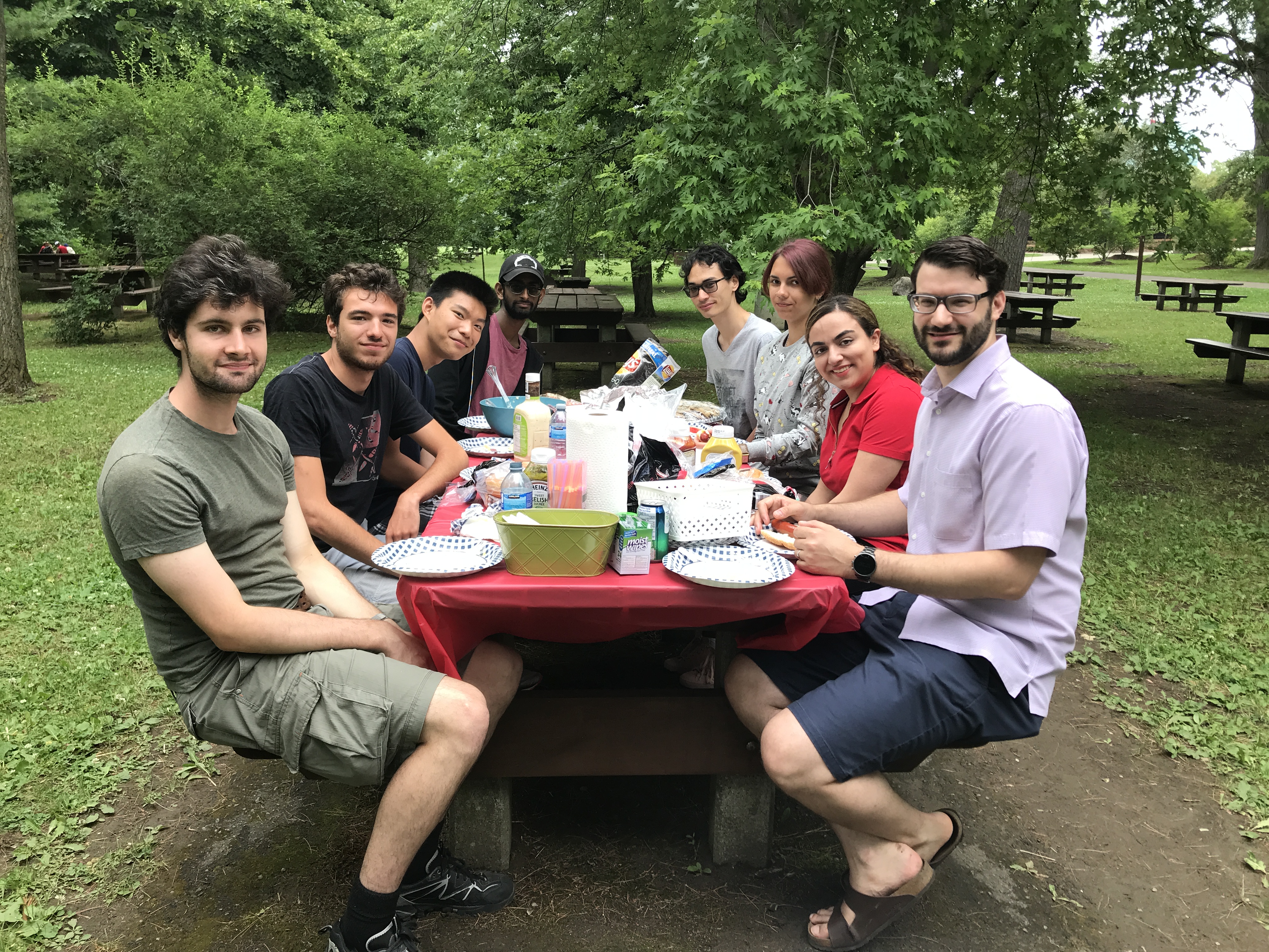 Everyone enjoying lunch together at the 1st Annual CyberSEA Research Lab Summer BBQ