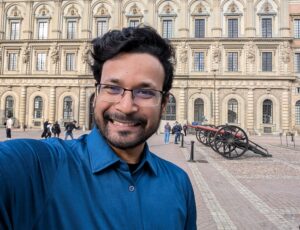 Alvi Jawad in front of the Swedish Royal Palace, Stockholm