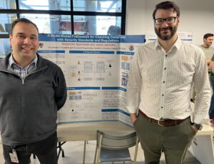 Jason Jaskolka and Stojanche Gjorcheski with his poster "Re-Usable Security Compliance-by-Design Framework: Building Resilient Systems, Including Legacy Integrations."