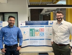 Jason Jaskolka and Alvi Jawad with his poster "What is Cyber-to-physical Impact Analysis? Concepts and Processes for Industrial Control Systems."