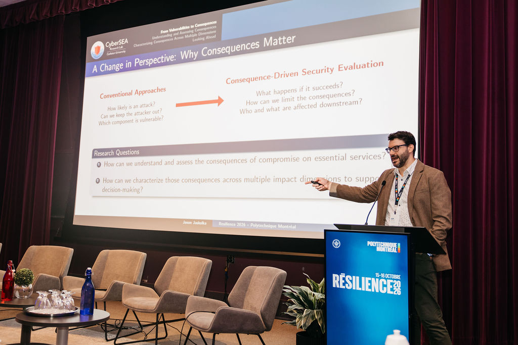 Jason Jaskolka explaining why consequences matter at Résilience 2026 at Polytechnique Montréal