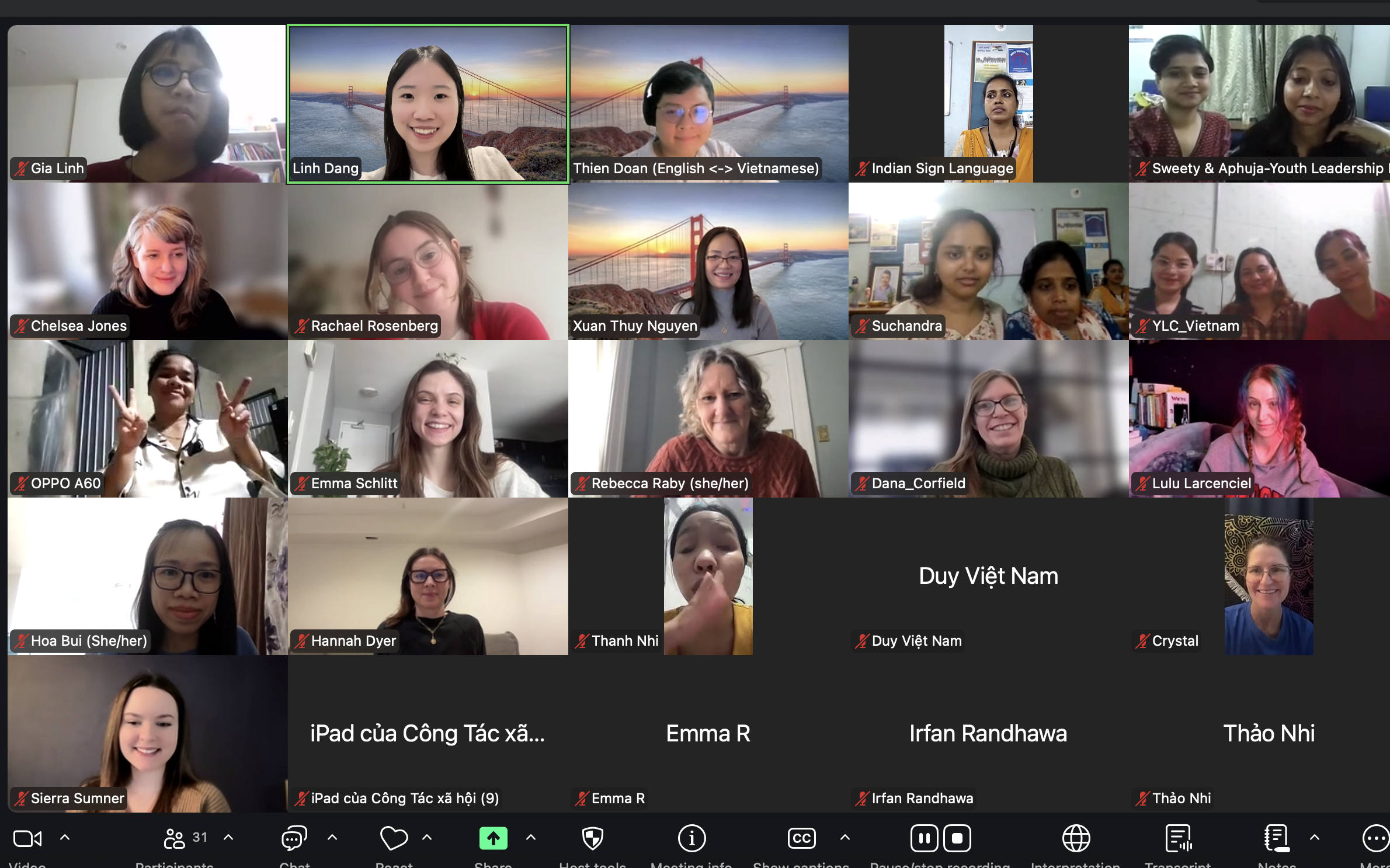Screenshot of a Zoom meeting showing participants with their cameras on and smiling
