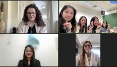 There are 7 people in the Zoom meeting, with 4 individuals appearing on the same screen, all holding fortune cakes.