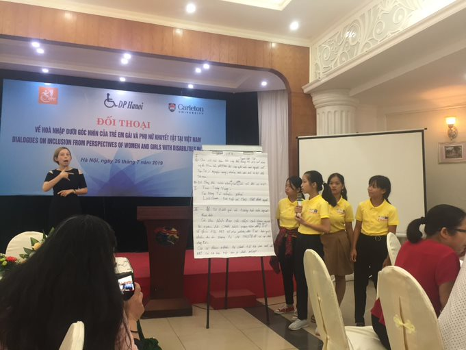 There are four girls with disabilities presenting their response. 