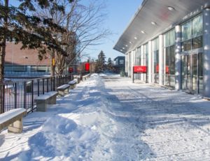 View of snowy pathway in front of Tory Building
