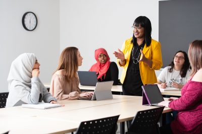 Instructor teaching students in classroom