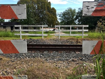 Image showing railway tracks and broken fence