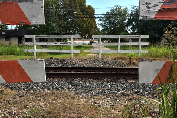 Image showing railway tracks and broken fence